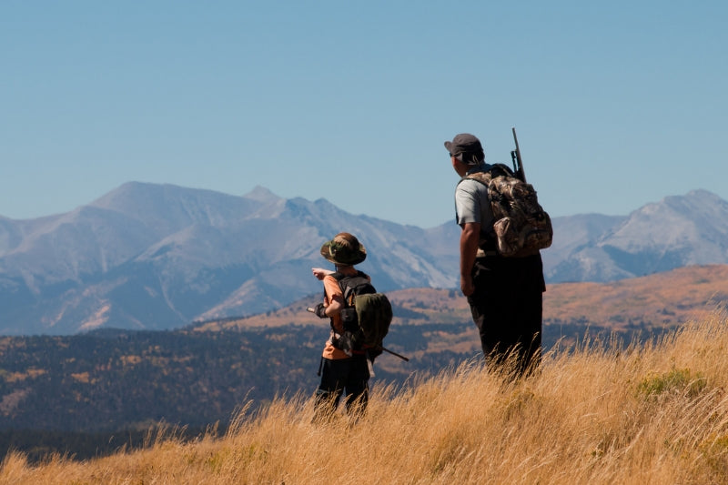 Two men in hunting gear