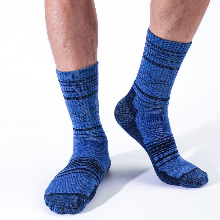 A Man Wearing Navy Merino Wool Shock Absorbent Running Crew Socks-1
