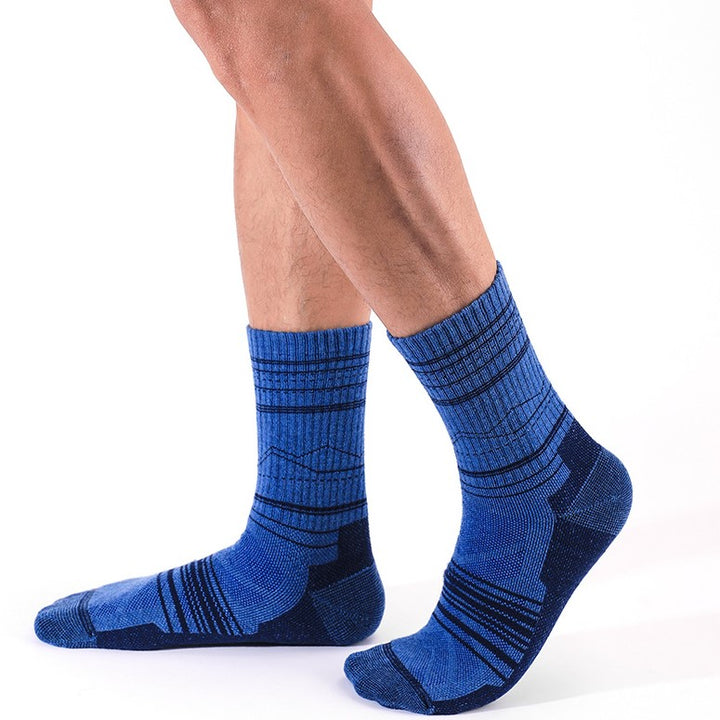 A Man Wearing Navy Merino Wool Shock Absorbent Running Crew Socks
