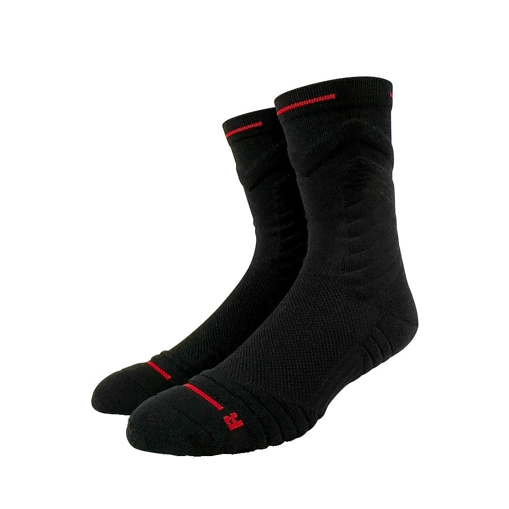 Black basketball socks with red accents, featuring cushioned soles for stability and comfort.