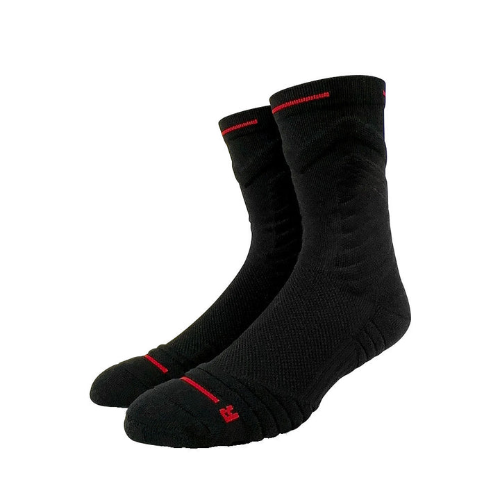 Black basketball socks with red accents, featuring cushioned soles for stability and comfort.