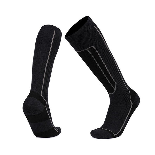 Merino wool over the calf skiing socks in black, designed for warmth and compression on the slopes