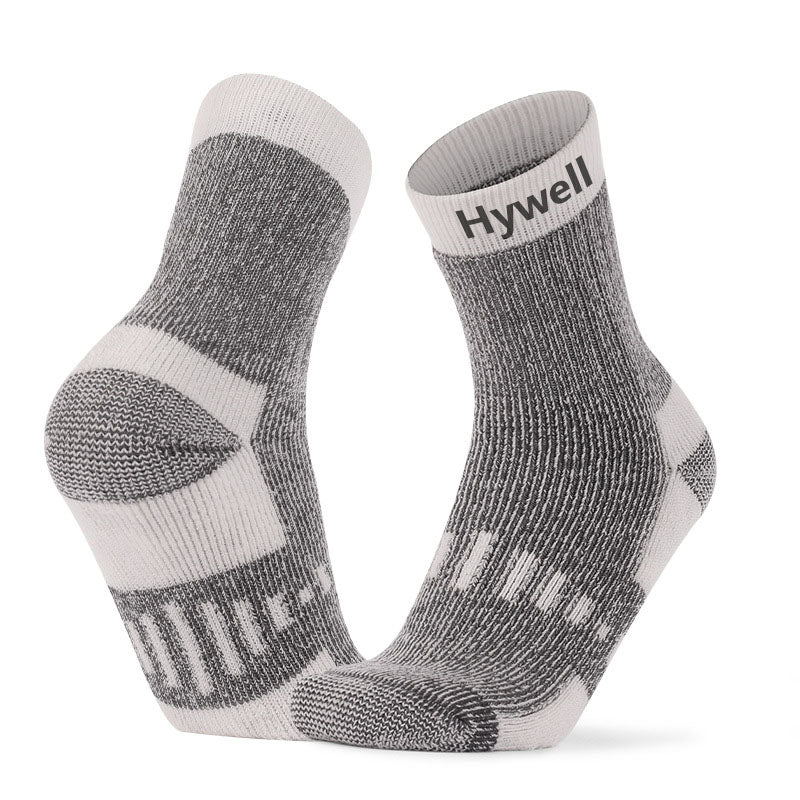 Merino wool running crew socks in grey and white with cushioned sole for enhanced support