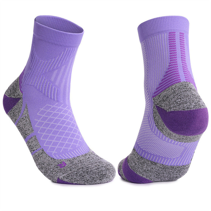 Purple and gray cushioned tennis socks with a snug fit and cushioned arch support, ideal for intense games.