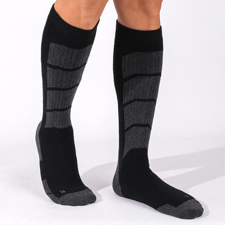 Wearing Black Impact-Absorbing Compression Running Over The Calf Socks