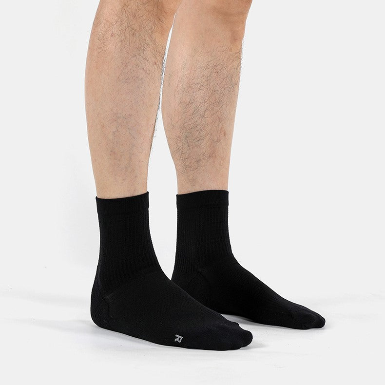 Wearing black Coolmax® Ultra Thin Running Quarter Socks-1