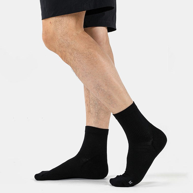 Wearing black Coolmax® Ultra Thin Running Quarter Socks