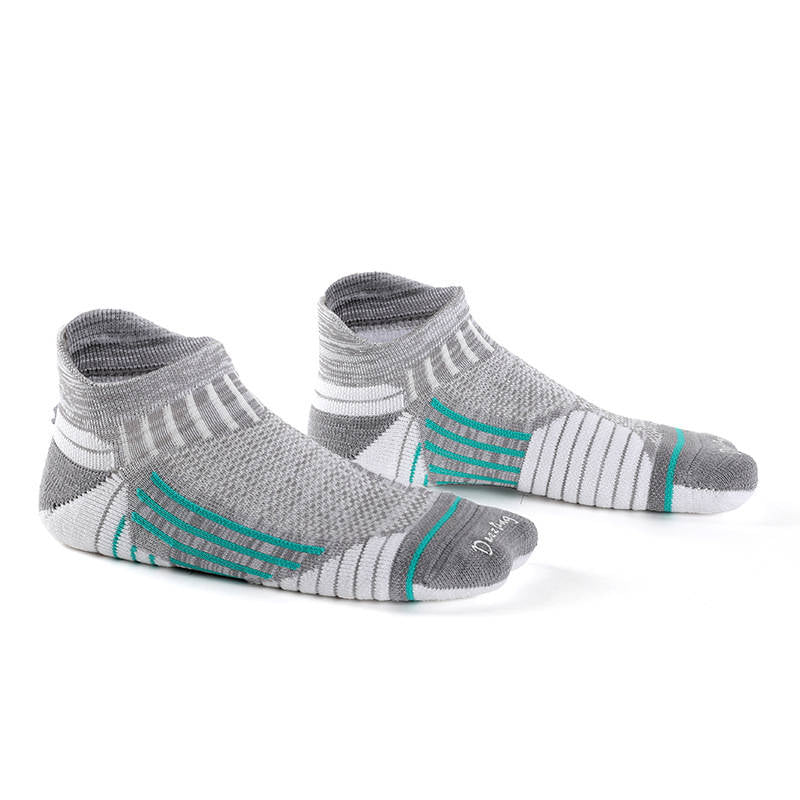 Gray compression running socks designed for comfort and stability during long-distance runs.
