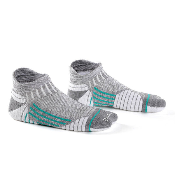 Gray compression running socks designed for comfort and stability during long-distance runs.
