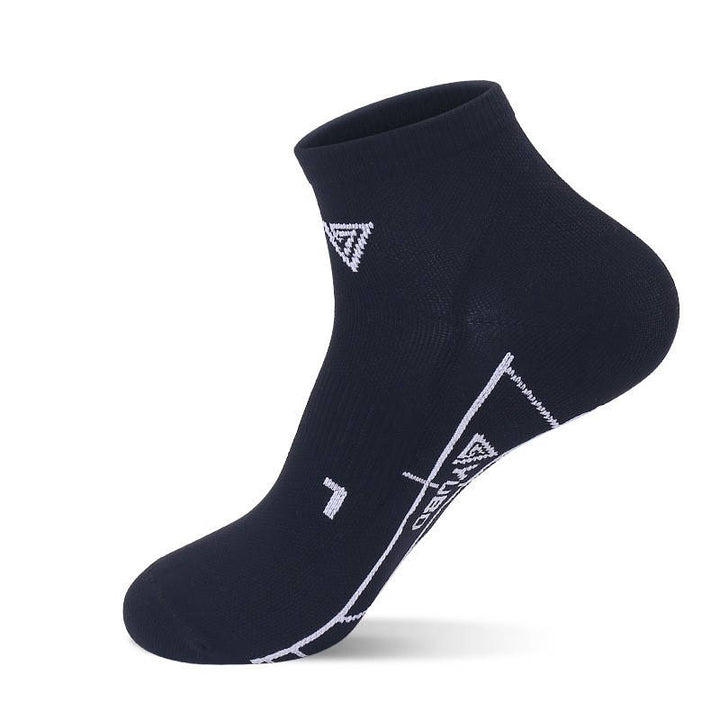 Black fitness socks with minimal design and quarter length cut for flexibility and performance.