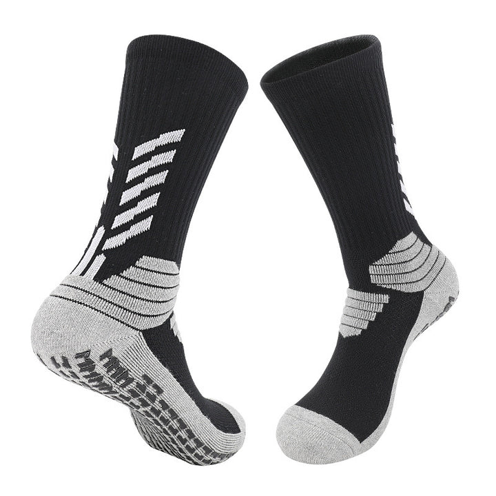 A pair of black basketball socks with gray highlights, designed with targeted cushioning, arch support, and breathable material for athletic performance.