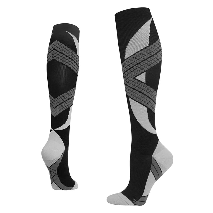 Black and gray cushioned running socks featuring moisture-wicking fabric and full-leg compression for running recovery.