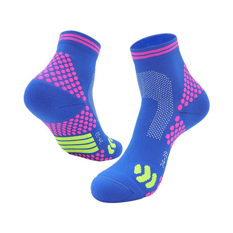 Blue and green tennis socks designed for agility, offering compression and moisture control.