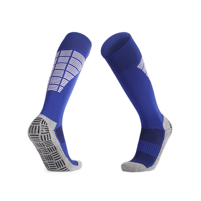 Blue soccer grip socks with anti-slip design and padded support for enhanced traction on the field.