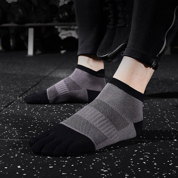 Gray toe socks for running offering a breathable, moisture-wicking design for long-distance runs.