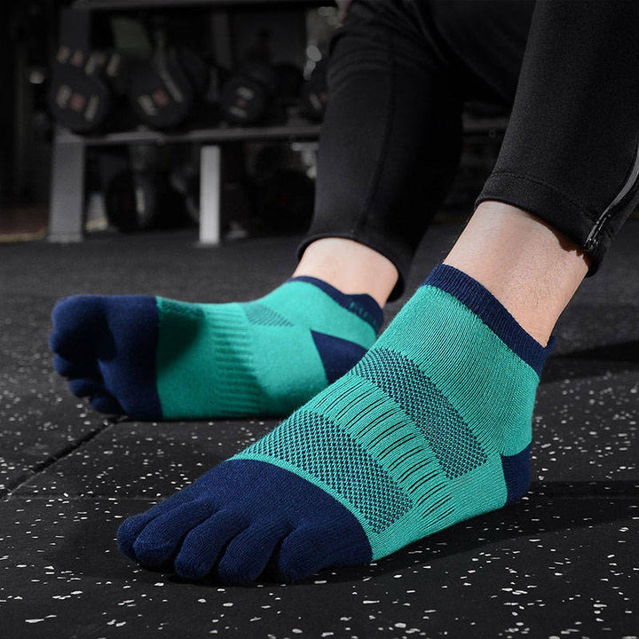 Green toe socks for running, designed to keep your feet cool and dry during intense workouts.