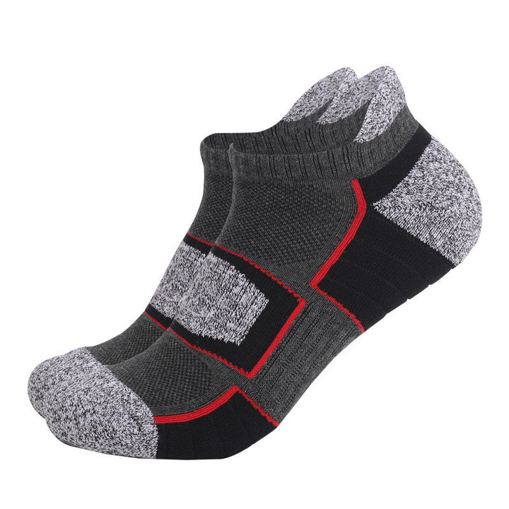 Dark gray and black ankle socks with red accents.