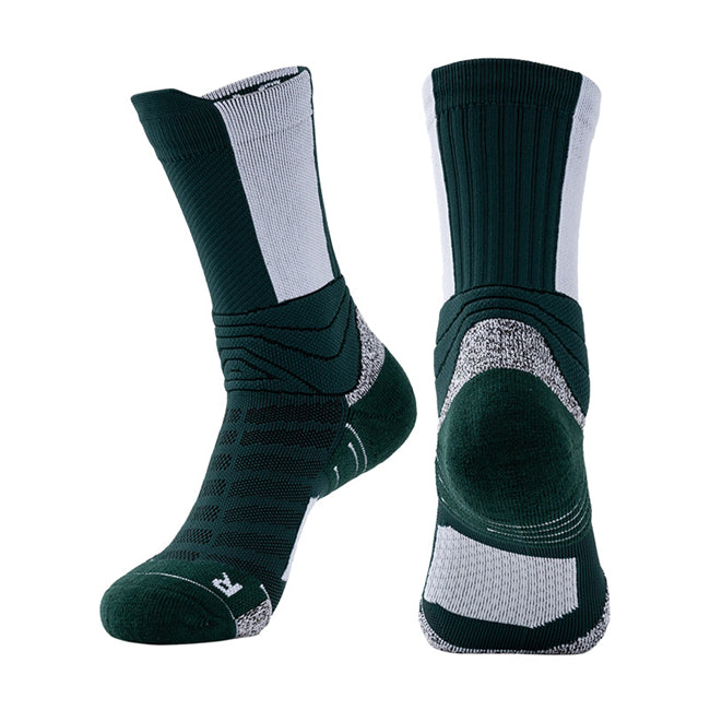 Cushioned basketball socks in green and white with compression fit for muscle support.