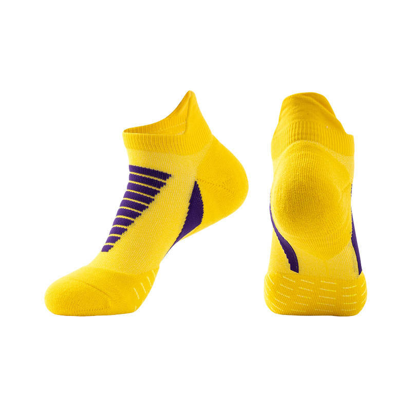 Yellow thick padded running socks delivering cushioning and comfort for long-distance runs.