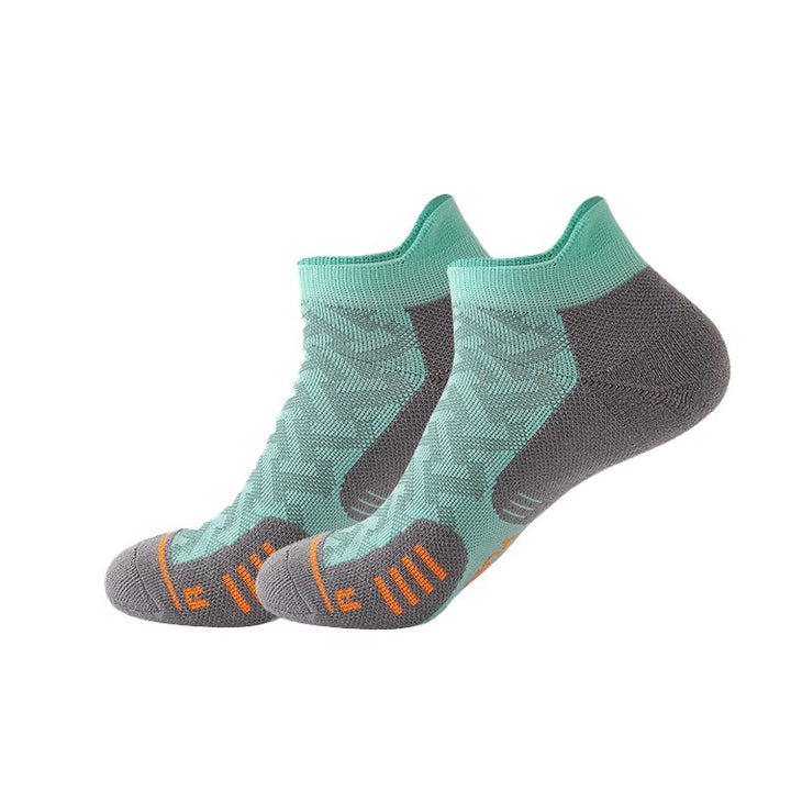 Teal and gray running socks with cushioned arch support and moisture-wicking material, perfect for long training sessions.