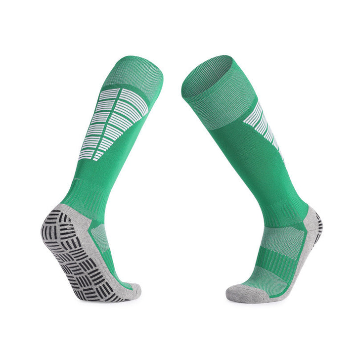 Green soccer grip socks offering superior grip and comfort on the field.