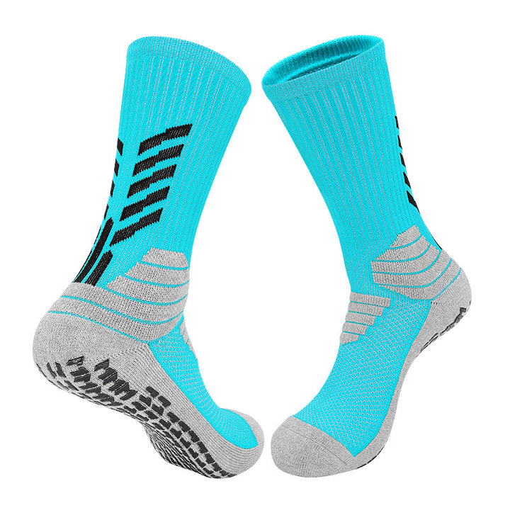 A pair of high-performance basketball socks in bright turquoise and gray, featuring cushioned soles, arch support, and moisture-wicking properties.