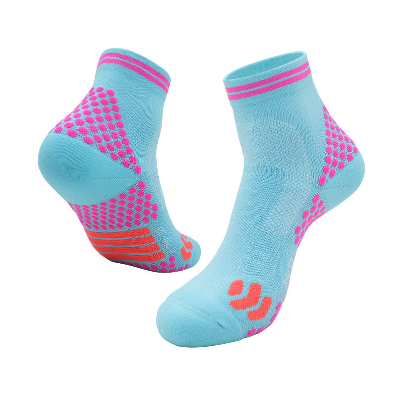 Pink and blue tennis socks with mesh ventilation and cushioning for extended play and comfort.