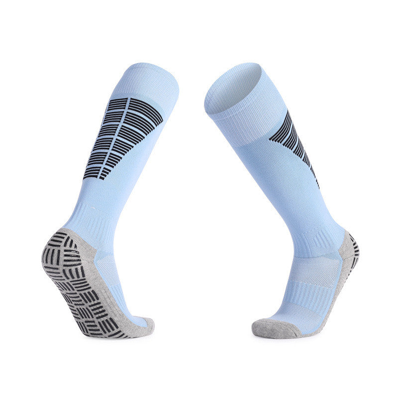 Blue and gray soccer grip socks with moisture-wicking properties.