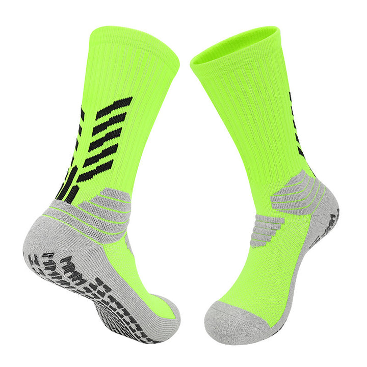 A pair of neon green basketball socks with light gray details, featuring ergonomic cushioning, arch support, and a moisture-wicking design for enhanced athletic performance.