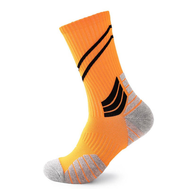 Orange fitness socks with bold black accents, offering compression and cushioning for active performance.