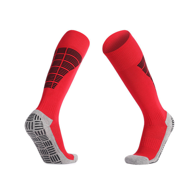 Red soccer grip socks with cushioned padding for foot protection.