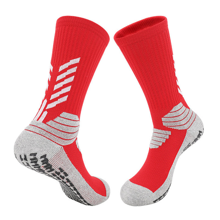 A pair of vibrant red basketball socks with gray accents, featuring reinforced cushioning, arch compression, and a design optimized for moisture management.