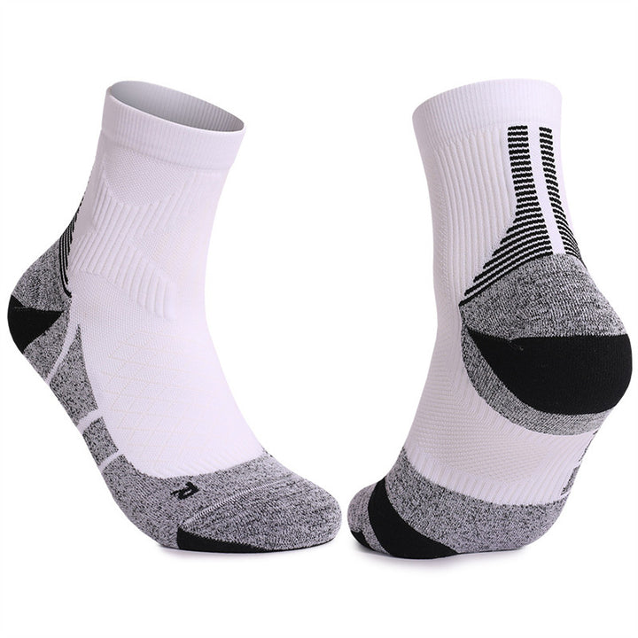 White and gray cushioned tennis socks with moisture-wicking fabric, providing breathability and comfort during matches.