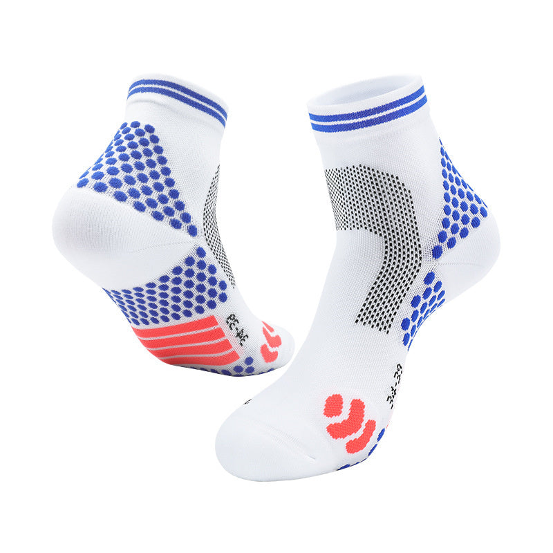 White and blue tennis socks with padded support and flexible fit for comfort during intense matches.