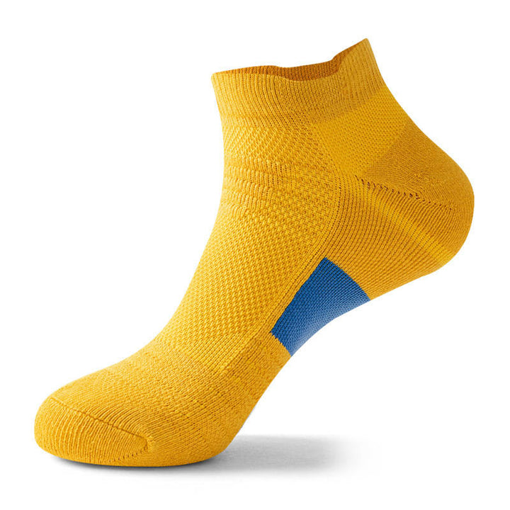Yellow cushioned socks for walking, featuring a bright design and soft cushioning for added comfort.